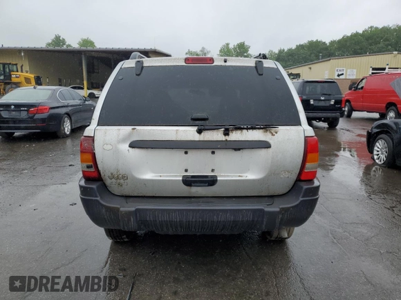2004 Jeep Grand Cherokee Laredo z VIN 1J4GW48S74C288625, wystawiony jako Copart lot #61290805 z przebiegiem 194 615 mil mil oraz Czysty tytuł • Clean title. Historia ofert i sprzedaży dostępna na DreamBid. Obrazek 6.