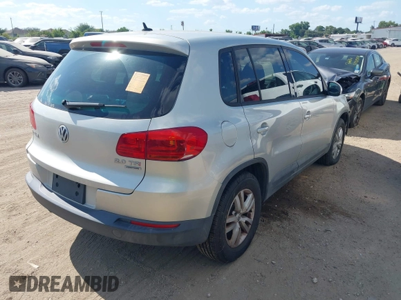 2013 Volkswagen Tiguan SE z VIN WVGBV7AX3DW502501, wystawiony jako IAAI lot #42827693 z przebiegiem 107 413 mil mil oraz . Historia ofert i sprzedaży dostępna na DreamBid. Obrazek 4.