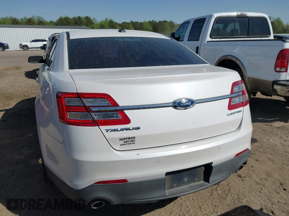 2013 Ford Taurus Limited with VIN 1FAHP2F82DG218533, listed as a IAAI auction lot 41934075 with 172,173 mi miles and . Bid and sale history available at DreamBid. Image 16.
