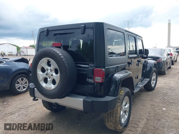 2013 Jeep Wrangler Unlimited Sahara with VIN 1C4BJWEG2DL549864, listed as a IAAI auction lot 42250556 with 231,018 mi miles and . Bid and sale history available at DreamBid. Image 4.