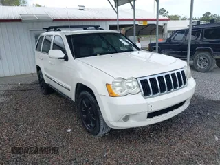 2008 Jeep Grand Cherokee Limited z VIN 1J8HS582X8C100612, wystawiony jako IAAI lot #41934146 z przebiegiem 148 852 mil mil oraz . Historia ofert i sprzedaży dostępna na DreamBid. Obrazek 1.
