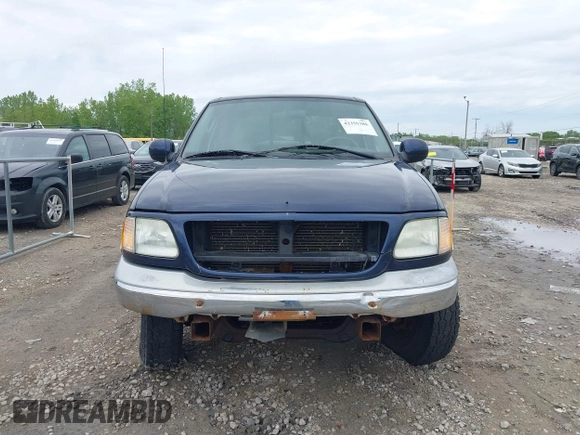 2003 Ford F-150 XLT with VIN 1FTRW08L63KD55851, listed as a IAAI auction lot 42359388 with Not provided miles and . Bid and sale history available at DreamBid. Image 12.
