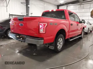 2015 Ford F-150 XLT with VIN 1FTEW1E85FFB26787, listed as a IAAI auction lot 42152326 with 61,825 mi miles and . Bid and sale history available at DreamBid. Image 4.