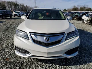 2018 Acura RDX w/Technology with VIN 5J8TB3H5XJL012960, listed as a Copart auction lot 44024514 with 77,179 mi miles and Salvage Title. Bid and sale history available at carsss.com. Image 5.