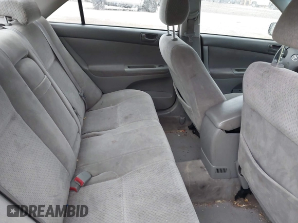 2002 Toyota Camry LE z VIN JTDBE32K720119418, wystawiony jako IAAI lot #42360721 z przebiegiem 235 678 mil mil oraz . Historia ofert i sprzedaży dostępna na DreamBid. Obrazek 8.
