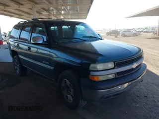 2002 Chevrolet Tahoe LT z VIN 1GNEK13ZX2J257347, wystawiony jako IAAI lot #42433634 z przebiegiem 252 817 mil mil oraz . Historia ofert i sprzedaży dostępna na DreamBid. Obrazek 1.
