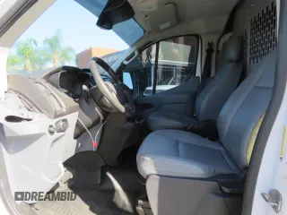 2018 Ford Transit z VIN 1FTYR1YG9JKA68352, wystawiony jako Copart lot #85918324 z przebiegiem 64 560 mil mil oraz Szkoda całkowita • Salvage title. Historia ofert i sprzedaży dostępna na DreamBid. Obrazek 9.
