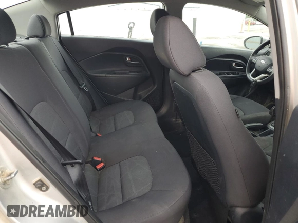 2013 Kia Rio LX z VIN KNADM4A35D6280066, wystawiony jako Copart lot #57293585 z przebiegiem 129 281 mil mil oraz Szkoda całkowita • Salvage title. Historia ofert i sprzedaży dostępna na DreamBid. Obrazek 10.