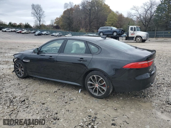 2016 Jaguar XF S with VIN SAJBM4BV0GCY00336, listed as a Copart auction lot 80828124 with 73,577 mi miles and Salvage Title. Bid and sale history available at carsss.com. Image 2.