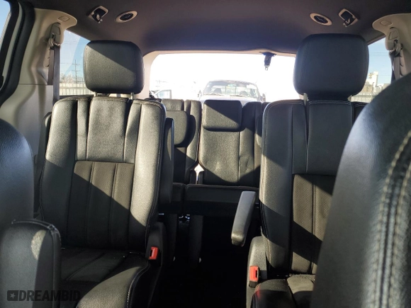 2019 Dodge Grand Caravan SXT with VIN 2C4RDGCG9KR743360, listed as a Copart auction lot 81699554 with 82,527 mi miles and Salvage Title. Bid and sale history available at carsss.com. Image 10.