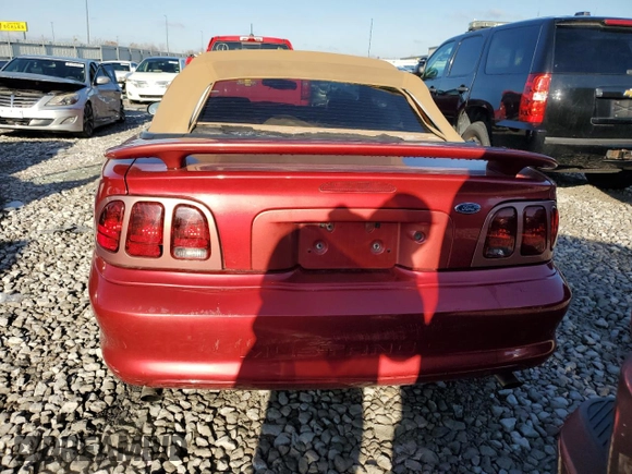 1998 Ford Mustang GT with VIN 1FAFP45X1WF248935, listed as a Copart auction lot 85225824 with 115,184 mi miles and Salvage Title. Bid and sale history available at carsss.com. Image 6.