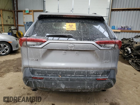 2021 Toyota RAV4 XLE with VIN 2T3W1RFV8MC169460, listed as a Copart auction lot 49215215 with 33,589 mi miles and Salvage Title. Bid and sale history available at carsss.com. Image 6.