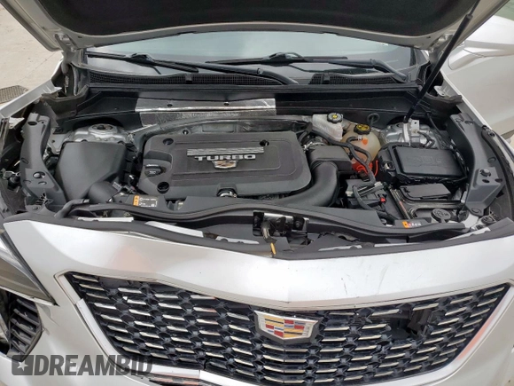 2020 Cadillac XT4 FWD Premium Luxury z VIN 1GYFZCR42LF115413, wystawiony jako Copart lot #56746785 z przebiegiem 41 296 mil mil oraz Szkody całkowita. Historia ofert i sprzedaży dostępna na DreamBid. Obrazek 12.