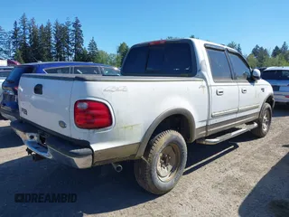 2001 Ford F-150 XLT with VIN 1FTRW08L21KC01442, listed as a IAAI auction lot 42163484 with 230,590 mi miles and . Bid and sale history available at DreamBid. Image 4.