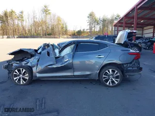 2018 Nissan Maxima SL with VIN 1N4AA6AP2JC377077, listed as a IAAI auction lot 40780334 with 77,366 mi miles. Bid and sale history available at carsss.com. Image 14.