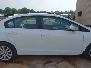 2012 Honda Civic EX with VIN 2HGFB2F82CH309404, listed as a IAAI auction lot 42080934 with 173,136 mi miles and . Bid and sale history available at DreamBid. Image 13.