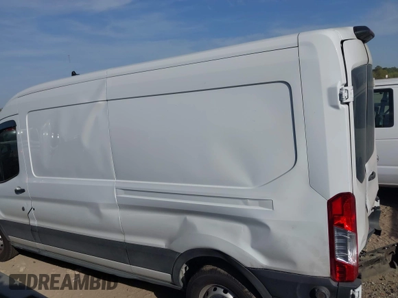 2020 Ford Transit Cargo with VIN 1FTBR1C81LKB10957, listed as a IAAI auction lot 41830210 with 86,006 mi miles and . Bid and sale history available at DreamBid. Image 14.