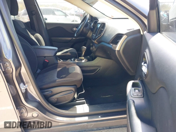 2014 Jeep Cherokee Latitude with VIN 1C4PJMCS2EW137767, listed as a IAAI auction lot 42052071 with 165,300 mi miles and . Bid and sale history available at DreamBid. Image 5.