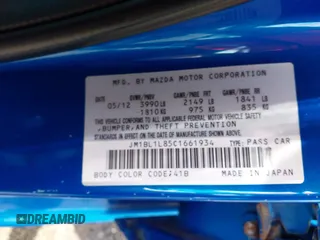 2012 Mazda 3 i Touring z VIN JM1BL1L85C1661934, wystawiony jako IAAI lot #42746228 z przebiegiem 165 386 mil mil oraz . Historia ofert i sprzedaży dostępna na DreamBid. Obrazek 9.