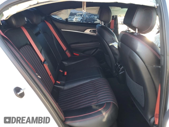 2022 Genesis G70 3.3T with VIN KMTG54TE9NU081984, listed as a Copart auction lot 79634704 with 63,169 mi miles and Salvage Title. Bid and sale history available at DreamBid. Image 10.