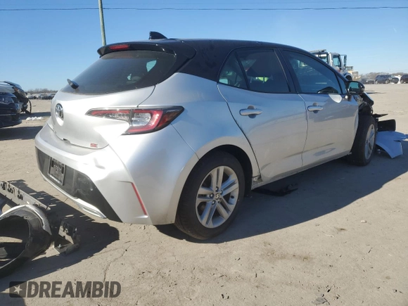 2021 Toyota Corolla Hatchback SE with VIN JTND4MBE5M3106109, listed as a Copart auction lot 80155133 with 27,710 mi miles and Salvage Title. Bid and sale history available at carsss.com. Image 3.