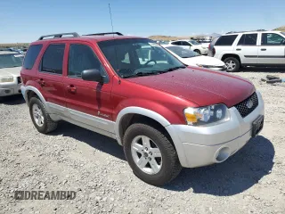 2007 Ford Escape Hybrid z VIN 1FMCU59H77KA61881, wystawiony jako Copart lot #64988665 z przebiegiem 242 536 mil mil oraz Czysty tytuł • Clean title. Historia ofert i sprzedaży dostępna na DreamBid. Obrazek 4.