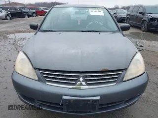 2006 Mitsubishi Lancer ES with VIN JA3AJ26E76U066867, listed as a IAAI auction lot 41904428 with 247,460 mi miles. Bid and sale history available at carsss.com. Image 6.