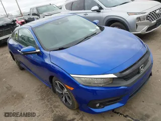 2016 Honda Civic Coupe Touring with VIN 2HGFC3B95GH357261, listed as a IAAI auction lot 41833489 with 131,375 mi miles. Bid and sale history available at carsss.com. Image 1.