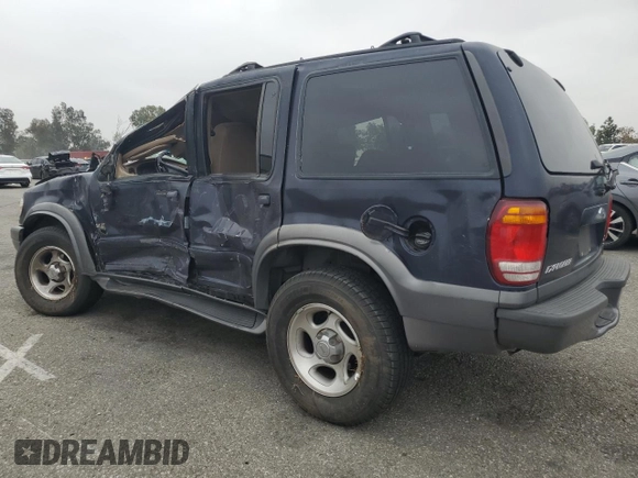 1999 Ford Explorer XLT with VIN 1FMZU34E6XZC14009, listed as a Copart auction lot 55251525 with 253,681 mi miles and Salvage title. Bid and sale history available at DreamBid. Image 2.