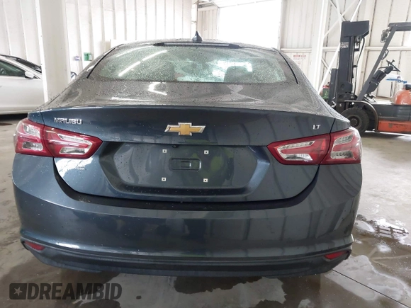 2020 Chevrolet Malibu LT with VIN 1G1ZD5STXLF052438, listed as a IAAI auction lot 42006000 with 140,513 mi miles and . Bid and sale history available at DreamBid. Image 16.