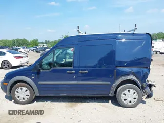 2012 Ford Transit Connect XLT z VIN NM0LS7BN7CT093544, wystawiony jako IAAI lot #42602776 z przebiegiem 195 522 mil mil oraz . Historia ofert i sprzedaży dostępna na DreamBid. Obrazek 15.