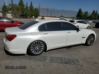 2012 BMW 7 Series 740Li with VIN WBAKB4C55CC575826, listed as a Copart auction lot 74012564 with 140,577 mi miles and Salvage Title. Bid and sale history available at carsss.com. Image 3.