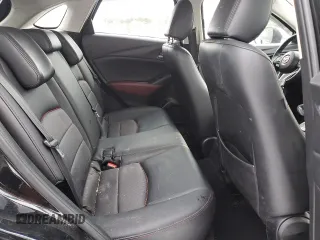 2016 Mazda CX-3 Touring z VIN JM1DKBC75G0122928, wystawiony jako Copart lot #44711625 z przebiegiem 74 217 mil mil oraz Szkoda całkowita • Salvage title. Historia ofert i sprzedaży dostępna na DreamBid. Obrazek 10.