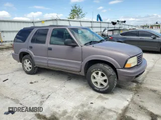 1998 Oldsmobile Bravada z VIN 1GHDT13W9W2718457, wystawiony jako Copart lot #55341755 z przebiegiem 133 968 mil mil oraz Tytuł czysty. Historia ofert i sprzedaży dostępna na DreamBid. Obrazek 4.