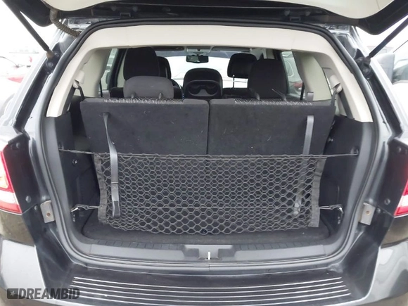 2013 Dodge Journey SXT with VIN 3C4PDCBB1DT565028, listed as a IAAI auction lot 41483127 with 129,997 mi miles. Bid and sale history available at carsss.com. Image 8.