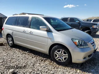 2007 Honda Odyssey EX-L z VIN 5FNRL38647B028078, wystawiony jako Copart lot #56208005 z przebiegiem 192 000 mil mil oraz Szkoda całkowita • Salvage title. Historia ofert i sprzedaży dostępna na DreamBid. Obrazek 4.
