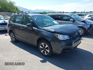 2018 Subaru Forester with VIN JF2SJABC1JH460419, listed as a IAAI auction lot 42292895 with 141,486 mi miles and . Bid and sale history available at DreamBid. Image 1.