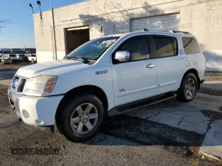 2006 Nissan Armada LE z VIN 5N1AA08B46N715720, wystawiony jako Copart lot #87299074 z przebiegiem 141 564 mil mil oraz Czysty tytuł • Clean title. Historia ofert i sprzedaży dostępna na DreamBid. Obrazek 1.