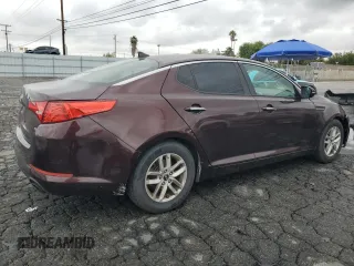 2011 Kia Optima LX z VIN KNAGM4A72B5116910, wystawiony jako Copart lot #55839845 z przebiegiem 187 943 mil mil oraz Szkoda całkowita • Salvage title. Historia ofert i sprzedaży dostępna na DreamBid. Obrazek 3.