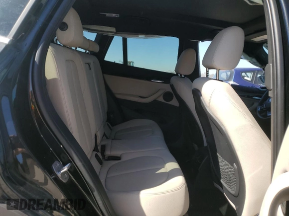 2021 BMW X1 xDrive28i with VIN WBXJG9C06M5U39389, listed as a Copart auction lot 46702675 with 39,594 mi miles and Salvage Title. Bid and sale history available at carsss.com. Image 12.