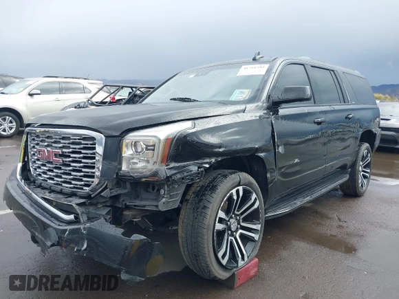 2019 GMC Yukon XL SLT with VIN 1GKS1GKC7KR155668, listed as a IAAI auction lot 41751792 with 163,537 mi miles. Bid and sale history available at carsss.com. Image 6.