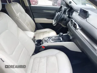 2018 Mazda CX-5 Grand Touring z VIN JM3KFADM8J1406007, wystawiony jako IAAI lot #42008567 z przebiegiem 110 661 mil mil oraz . Historia ofert i sprzedaży dostępna na DreamBid. Obrazek 5.