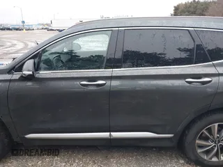 2019 Hyundai Santa Fe Limited with VIN 5NMS5CAD5KH130761, listed as a IAAI auction lot 41473255 with 61,344 mi miles. Bid and sale history available at carsss.com. Image 15.
