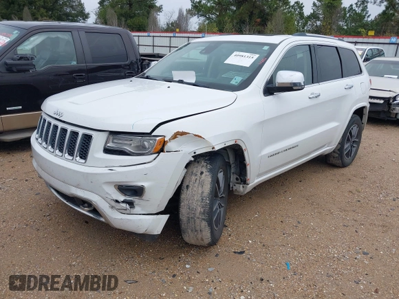 2014 Jeep Grand Cherokee Overland with VIN 1C4RJECG4EC543092, listed as a IAAI auction lot 40981315 with 149,096 mi miles. Bid and sale history available at carsss.com. Image 18.