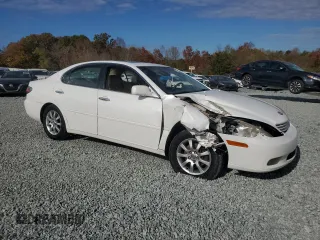 2002 Lexus ES 300 with VIN JTHBF30GX25018502, listed as a Copart auction lot 79828334 with 296,986 mi miles and Salvage Title. Bid and sale history available at DreamBid. Image 4.