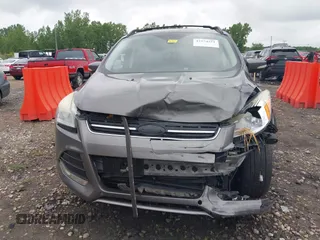 2013 Ford Escape SEL with VIN 1FMCU9HX4DUC75565, listed as a IAAI auction lot 42574351 with 180,876 mi miles and . Bid and sale history available at DreamBid. Image 13.