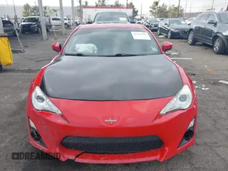 2016 Scion FR-S with VIN JF1ZNAA11G9709120, listed as a IAAI auction lot 41361502 with 74,281 mi miles. Bid and sale history available at carsss.com. Image 13.