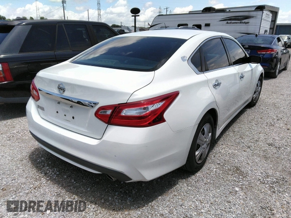 2017 Nissan Altima SV with VIN 1N4AL3AP0HC288742, listed as a IAAI auction lot 42560397 with 206,089 mi miles and . Bid and sale history available at DreamBid. Image 4.