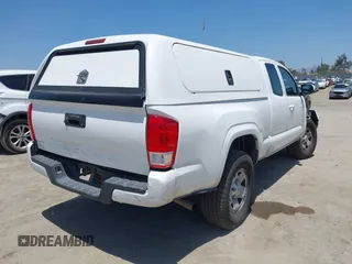 2017 Toyota Tacoma SR with VIN 5TFRX5GN4HX093545, listed as a IAAI auction lot 42505789 with 128,832 mi miles and . Bid and sale history available at DreamBid. Image 4.