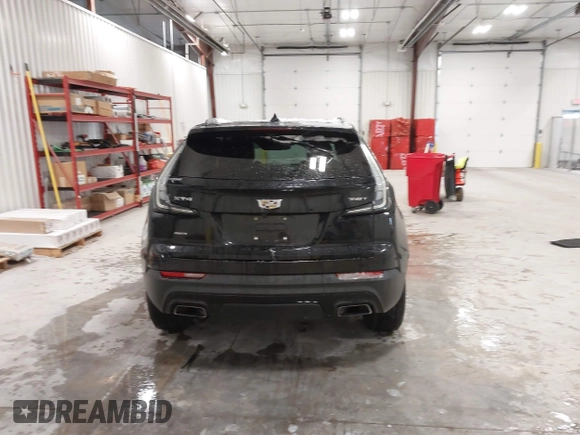 2020 Cadillac XT4 AWD Sport with VIN 1GYFZFR43LF090264, listed as a IAAI auction lot 41261586 with 65,859 mi miles and . Bid and sale history available at DreamBid. Image 16.